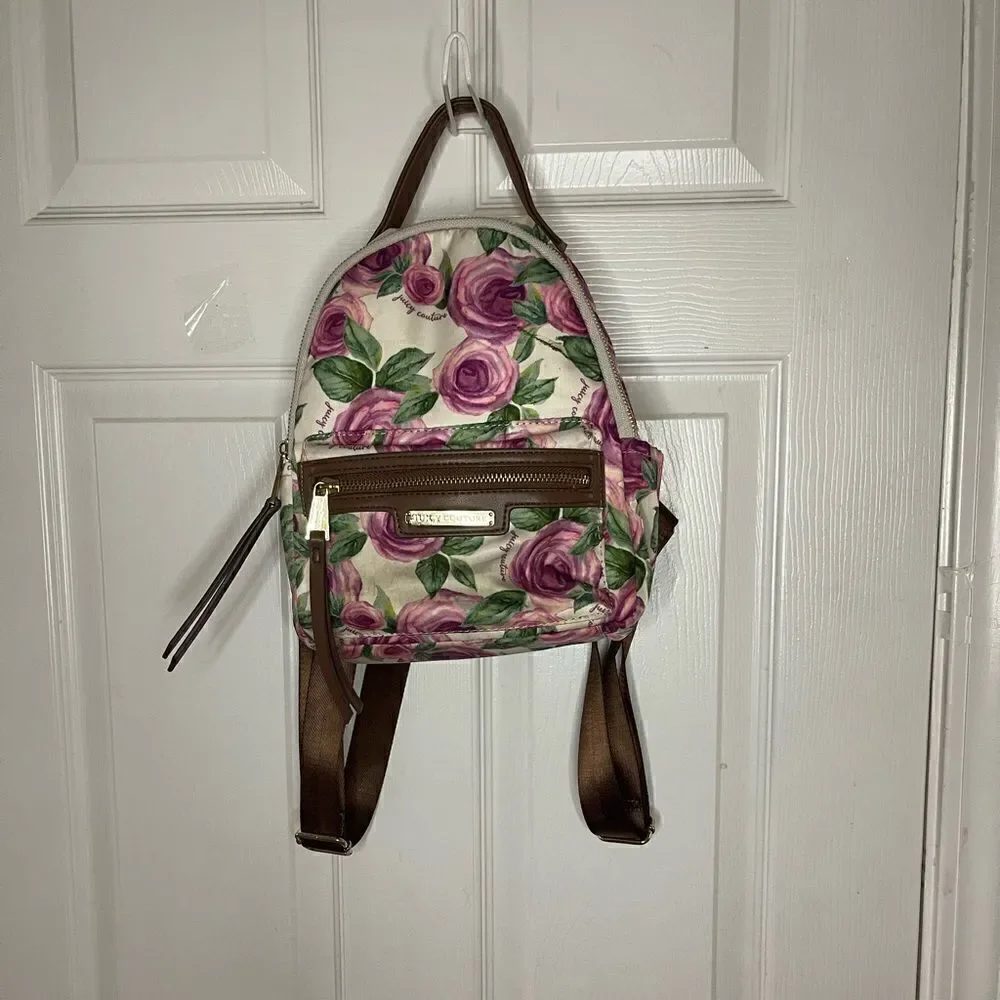 Juicy Couture Nylon mauve roses and green leaf prints mini backpack brown trims.